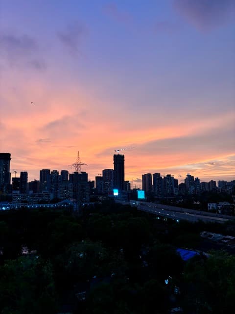 Pink and orange sunset over the Mumbai skyline